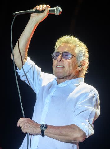 <p>Katja Ogrin/Redferns</p> Roger Daltrey of The Who performs with The Royal Philharmonic Concert Orchestra at Royal Sandringham Estate in August 2023 in Sandringham, Norfolk