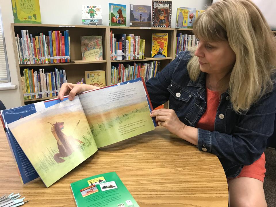Sioux Falls School District Teacher of the Year Susan Thies reads at Garfield Elementary School in this 2019 Argus Leader file photo.