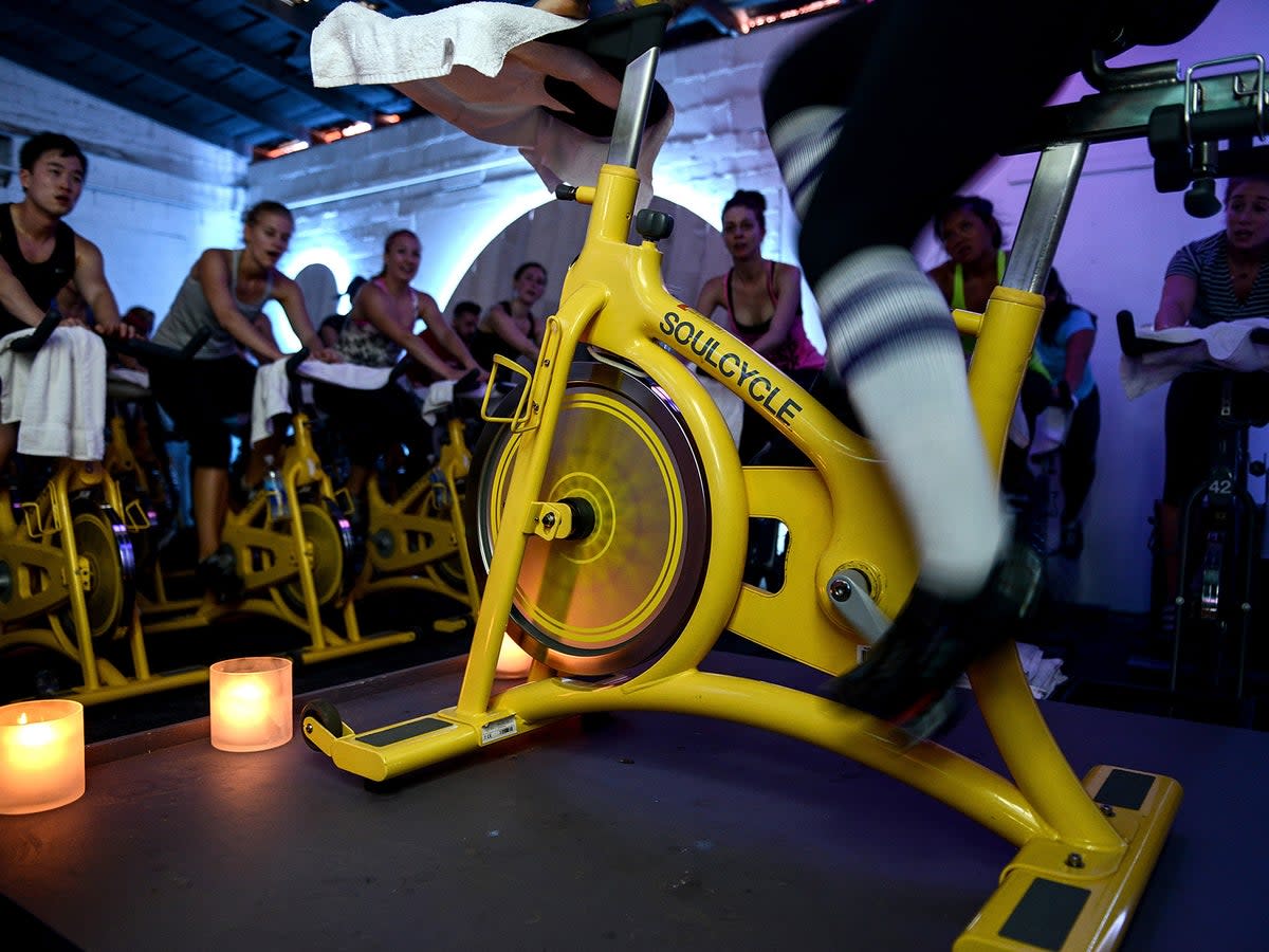 An instructor leads a SoulCycle class (Getty)