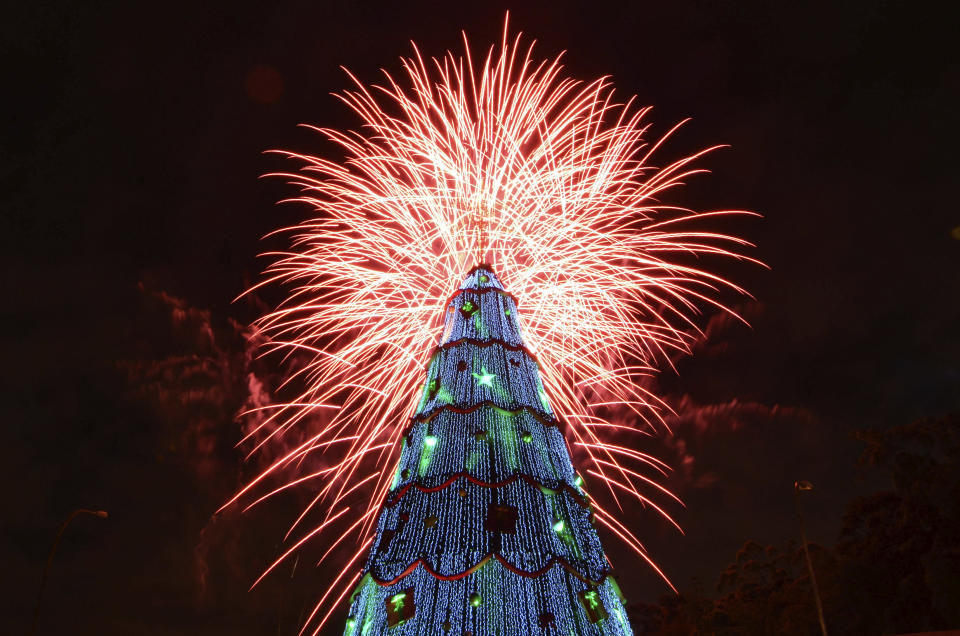 Show of fireworks at the opening of the large traditional Christmas tree in the city of Sao Paulo. The structure is almost 60 feet tall and has more than 500 lamps and 264 000 stroble micro-LED lamps on December 9, 2012 in Sao Paulo, Brazil. (Photo by Levi Bianco/News Free/LatinContent/Getty Images)