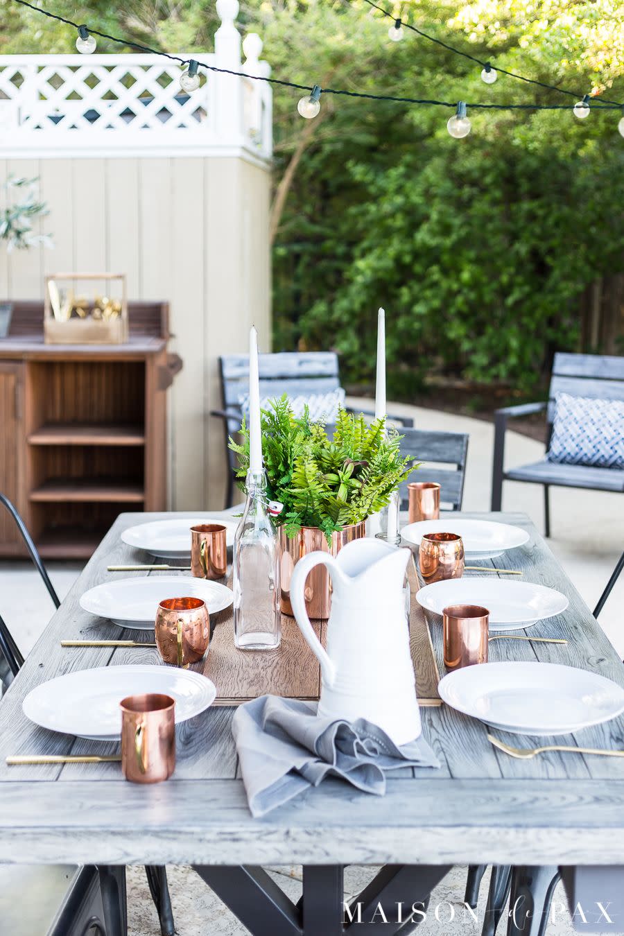 <p>No need to go overboard with the lighting. Just a simple strand draped over the table will look effortless. Plus, it will let your beautiful tablescape take center stage. </p><p><strong>See more at <a href="https://www.maisondepax.com/casually-elegant-summer-outdoor-dining/" rel="nofollow noopener" target="_blank" data-ylk="slk:Maison de Pax;elm:context_link;itc:0;sec:content-canvas" class="link ">Maison de Pax</a>.</strong></p><p><a class="link " href="https://www.amazon.com/Backyard-Hanging-Outdoor-Pergola-Deckyard/dp/B00RQHBZVS/?tag=syn-yahoo-20&ascsubtag=%5Bartid%7C10050.g.3404%5Bsrc%7Cyahoo-us" rel="nofollow noopener" target="_blank" data-ylk="slk:SHOP STRING LIGHTS;elm:context_link;itc:0;sec:content-canvas">SHOP STRING LIGHTS</a></p>