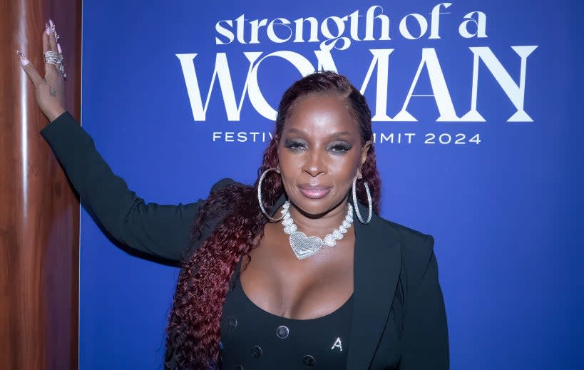 Mary J. Blige poses at an event for Strength of a Woman event