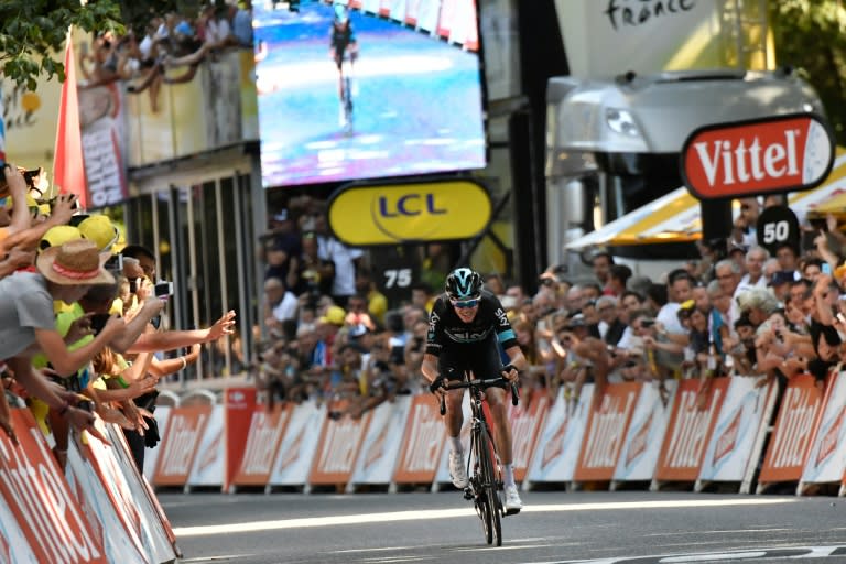 Great Britain's Chris Froome crosses the finish line of the eighth stage of the Tour de France on July 9, 2016