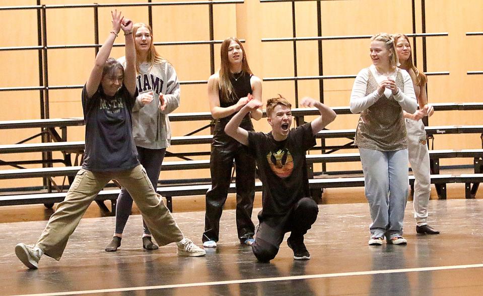 Senior Owen Radebaugh (center) rehearses with Ashland High School's Sing & Swing for May Fiesta.