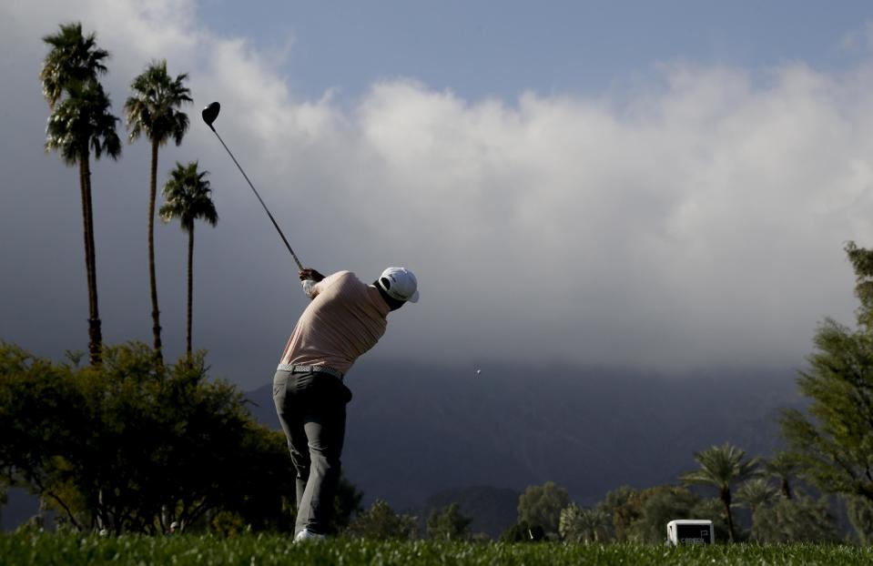 Harold Varner III watches his tee shot on the 13th hole during the first round of the CareerBuilder Challenge at the La Quinta County Club Thursday, Jan. 19, 2017 in La Quinta, Calif. (AP Photo/Chris Carlson)