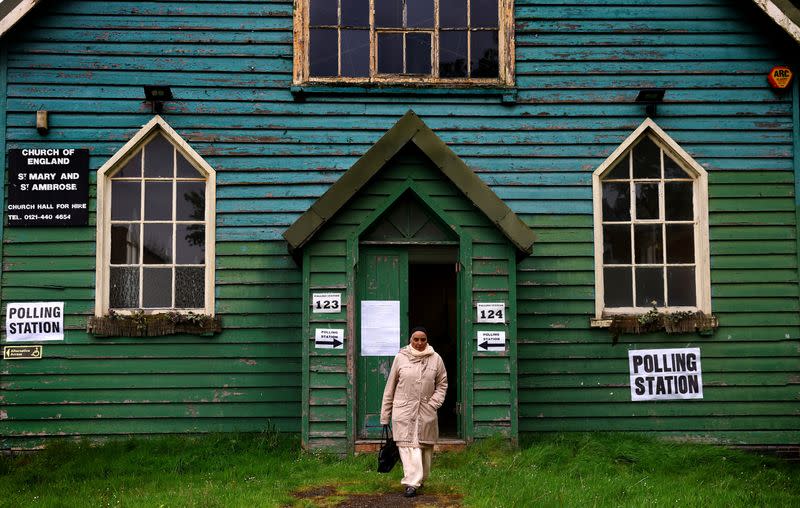 A lady leaves a polling station during local elections in Birmingham