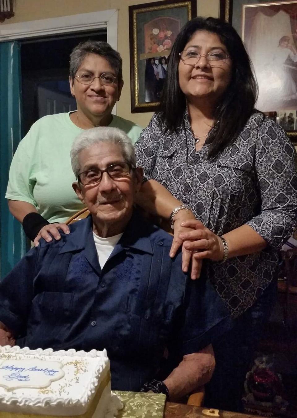 Guadalupe Ramirez (back left) with her partner Diane Muniz and her late father, Celedonio Ramirez. Guadalupe, who was at high risk for serious COVID-19, received monoclonal antibodies after her positive diagnosis in January 2021.