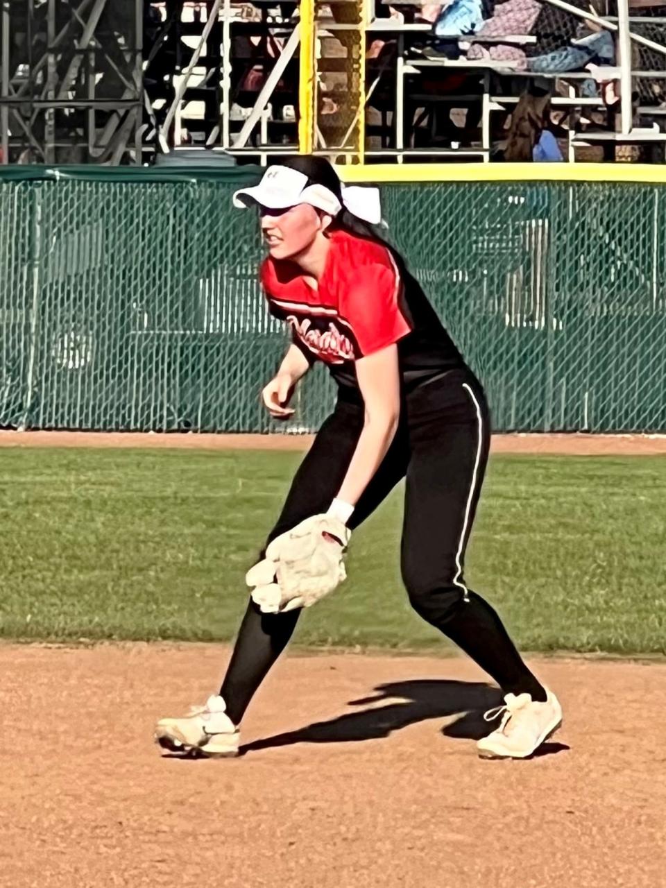 Marion Harding's Kameron Biederman gets set on defense during a softball game at Highland last season.