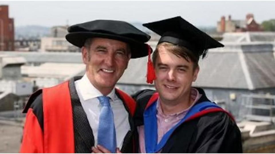 Kevin McCloud and Hugo McCloud in graduation outfits