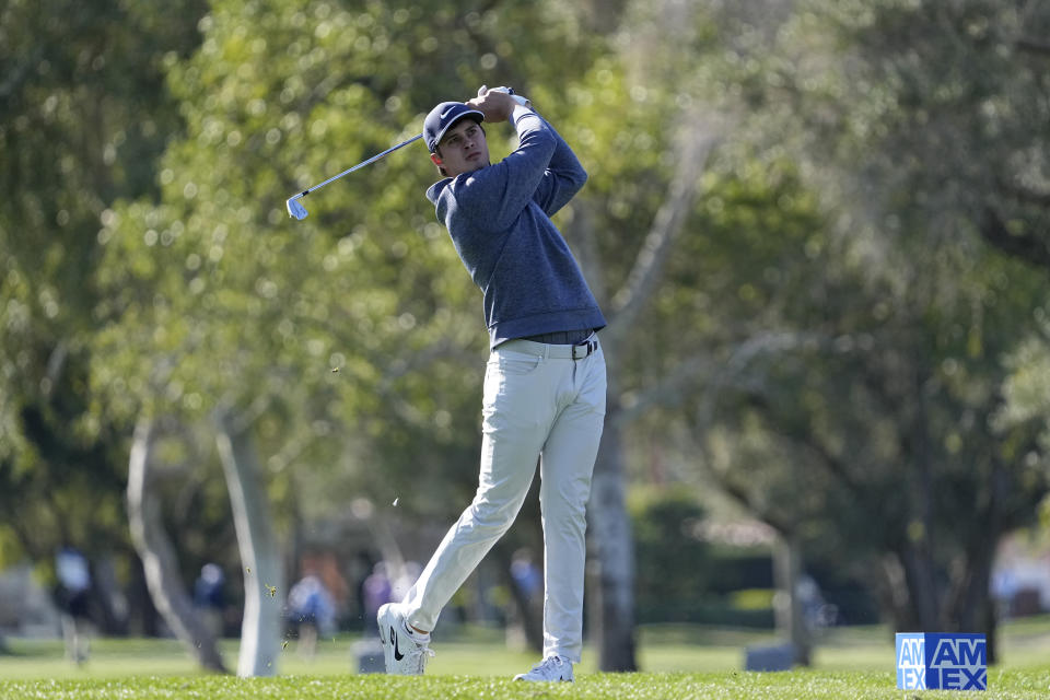 Davis Thompson hits from the 15th tee during the American Express golf tournament on the La Quinta Country Club Course Thursday, Jan. 19, 2023, in La Quinta, Calif. (AP Photo/Mark J. Terrill)