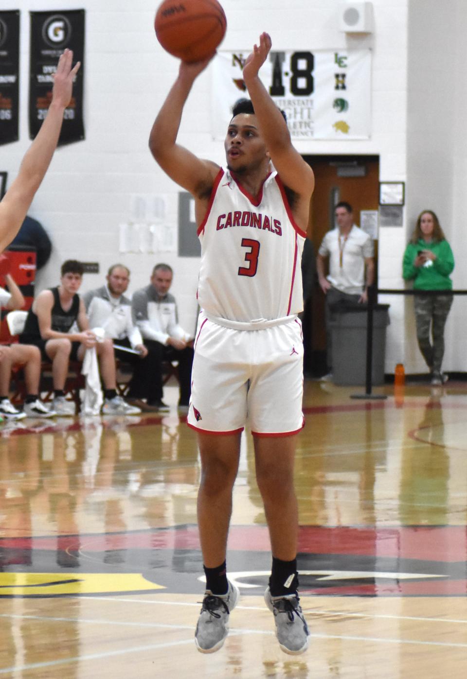 Coldwater's Elijah Sloan (3) buries one of his four three pointers Friday night