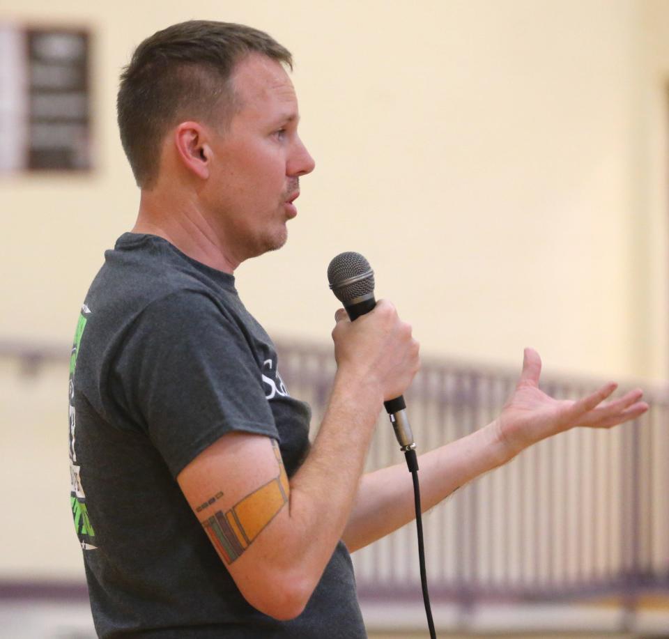 Tom Phillips, executive director of Stark Fresh, speaks during meeting for the southwest community to ask questions about the future grocery and health care center planned for Gonder Avenue at Patrick Elementary School in Canton on Thursday, June 30, 2022.