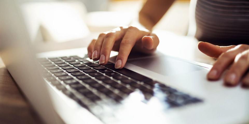 young woman working at home