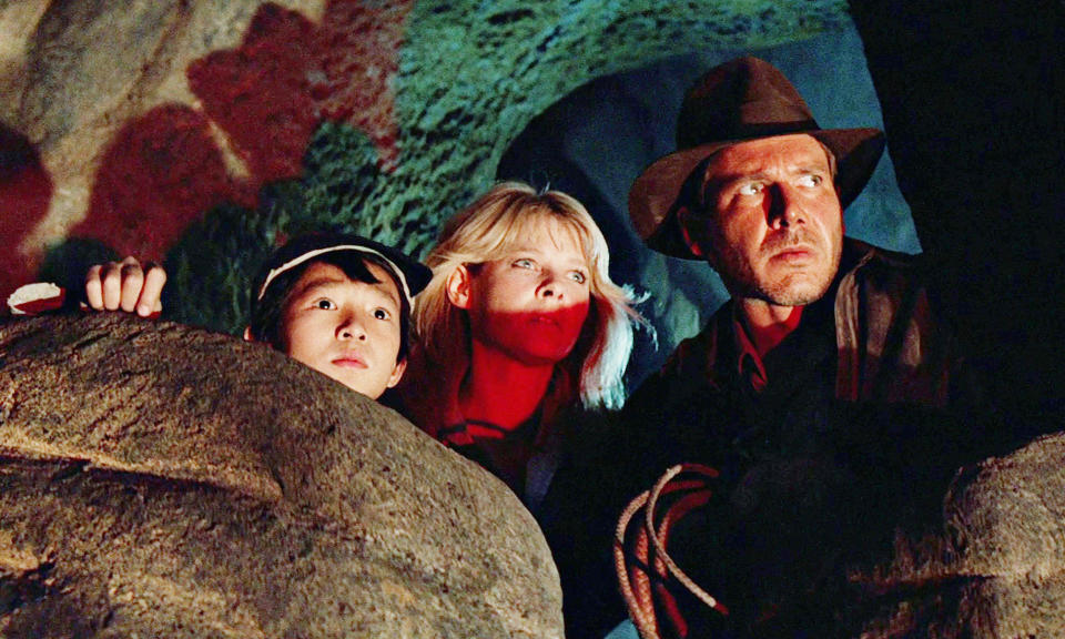 Ke Huy Quan, Kate Capshaw and Harrison Ford in Indiana Jones and The Temple of Doom, 1984. (Alamy )
