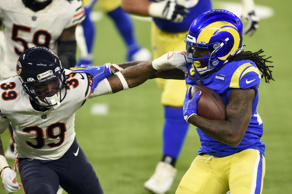 Los Angeles Rams running back Darrell Henderson, right, tries to get around Chicago Bears defensive back Eddie Jackson (39) during the second half of an NFL football game Monday, Oct. 26, 2020, in Inglewood, Calif. (AP Photo/Kelvin Kuo)