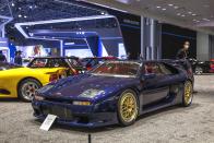 <p>Venturi is the least well-known brand here—the French marque built a series of stunning sports cars from 1984 until 2000 before switching focus to electric powertrains and competing in Formula E. The Venturi 400—nicknamed the “French F40” for its <a href="https://www.caranddriver.com/reviews/a32983963/tested-1991-ferrari-f40/" rel="nofollow noopener" target="_blank" data-ylk="slk:Ferrari-like;elm:context_link;itc:0;sec:content-canvas" class="link ">Ferrari-like</a> wedge shape and vertical rear wing—is a rare beast, with around 100 made. Of those, 73 units, including this Trophy model, were designated for racing, and the cars competed at endurance events such as the 24 Hours of Le Mans and 4 Hours of Spa.</p>