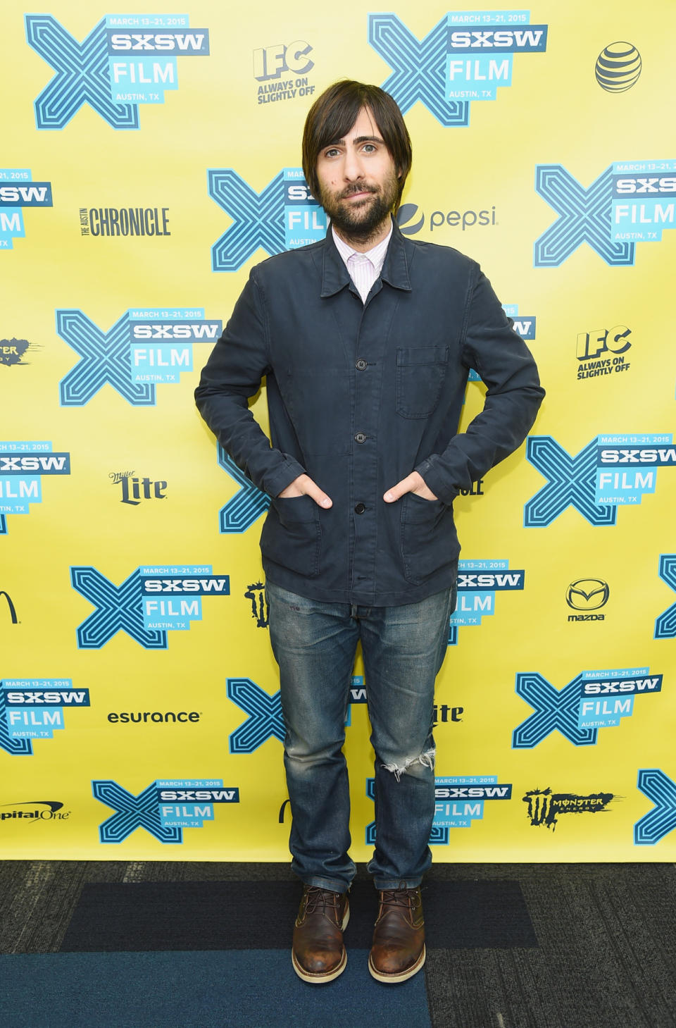 Jason Schwartzman nailed the whole Austin hipster vibe in distressed denim, leather desert boots, a white collared shirt, and navy blue cargo jacket. The facial hair helped with the vibe, too.