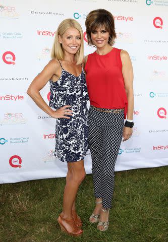 <p>Neilson Barnard/Getty</p> Kelly Ripa and Lisa Rinna in 2013