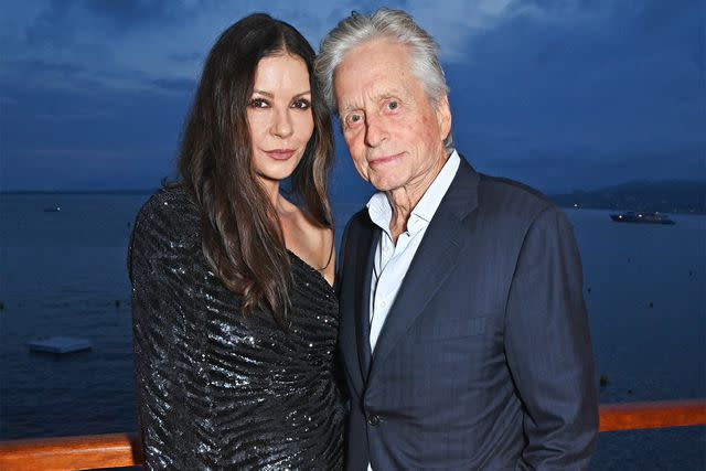 <p>Dave Benett/Getty</p> Catherine Zeta-Jones and Michael Douglas in Cannes