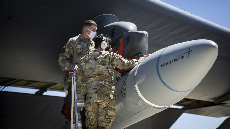 master sgt john malloy and staff sgt jacob puente, both from 912th aircraft maintenance squadron, secure the agm 183a air launched rapid response weapon instrumented measurement vehicle 2 arrw imv 2 as it is loaded under the wing of a b 52h stratofortress at edwards air force base, california, us, august 6, 2020 picture taken august 6, 2020 us air forcegiancarlo casemhandout via reuters attention editors this image has been supplied by a third party to match special report usa chinabombers rc2mpi9kim8t