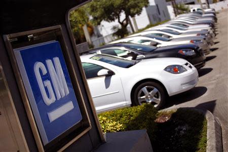 Chevrolet cars are seen at a GM dealership in Miami, Florida in this file photo from August 12, 2010. REUTERS/Carlos Barria/Files