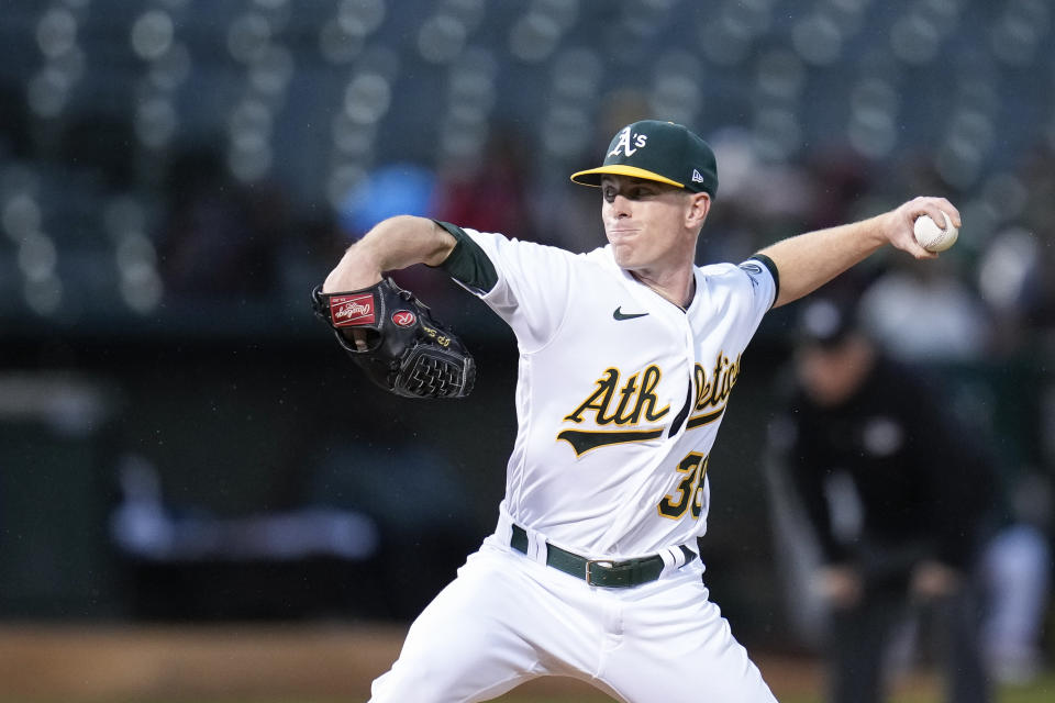 Oakland Athletics' JP Sears pitches against the Seattle Mariners during the first inning of a baseball game in Oakland, Calif., Wednesday, May 3, 2023. (AP Photo/Godofredo A. Vásquez)