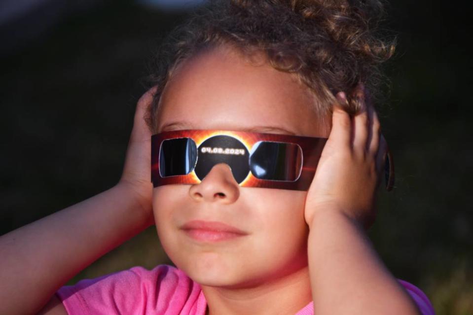 Except during the moment of totality, glasses should stay on at all times if you want to look directly at the sun. MALCOLM DENEMARK/FLORIDA TODAY / USA TODAY NETWORK