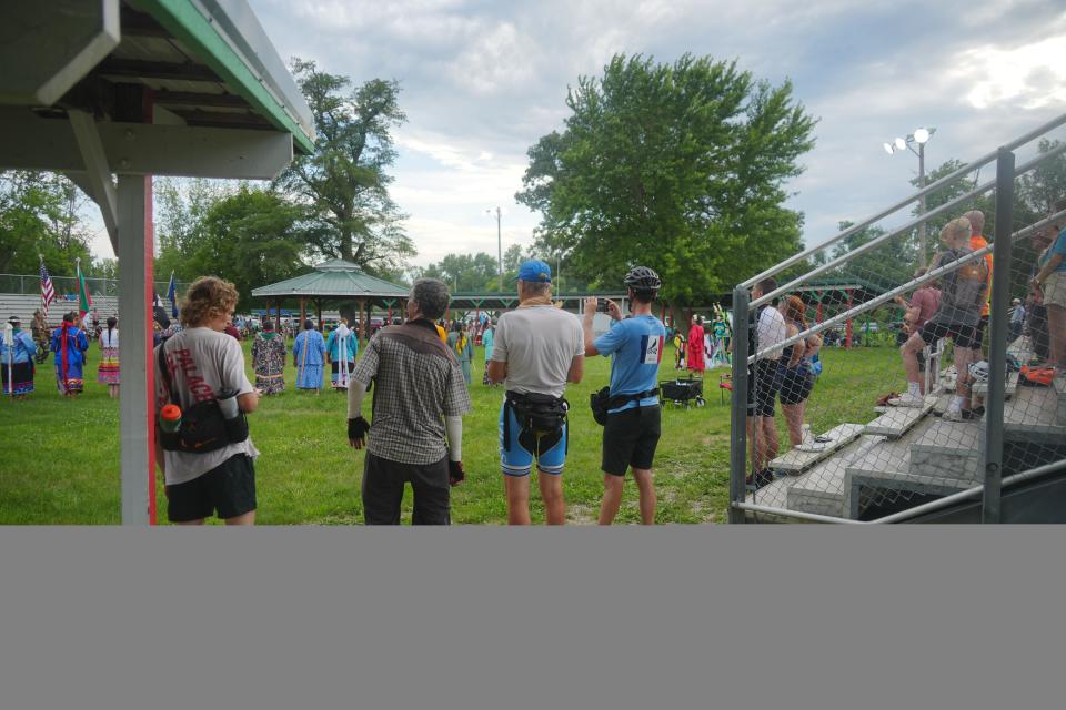 Riders attend a powwow at the Meskwaki Settlement as RAGBRAI 50 overnights Thursday in Tama-Toledo.