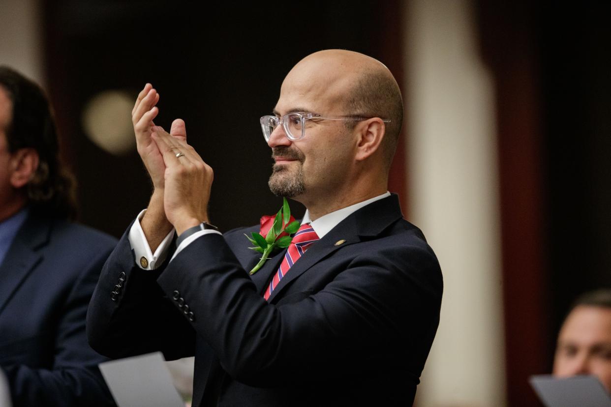 Rep. Tom Fabricio applauds as Speaker of the House Chris Sprowls presents his opening remarks to the Florida House of Representatives during opening day of the 2022 Florida Legislative Session Tuesday, Jan. 11, 2022. 