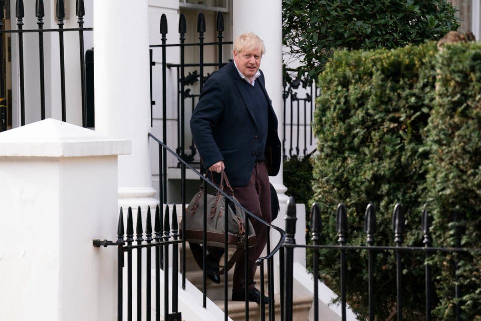 Boris Johnson leaves his home in London on Thursday (PA)