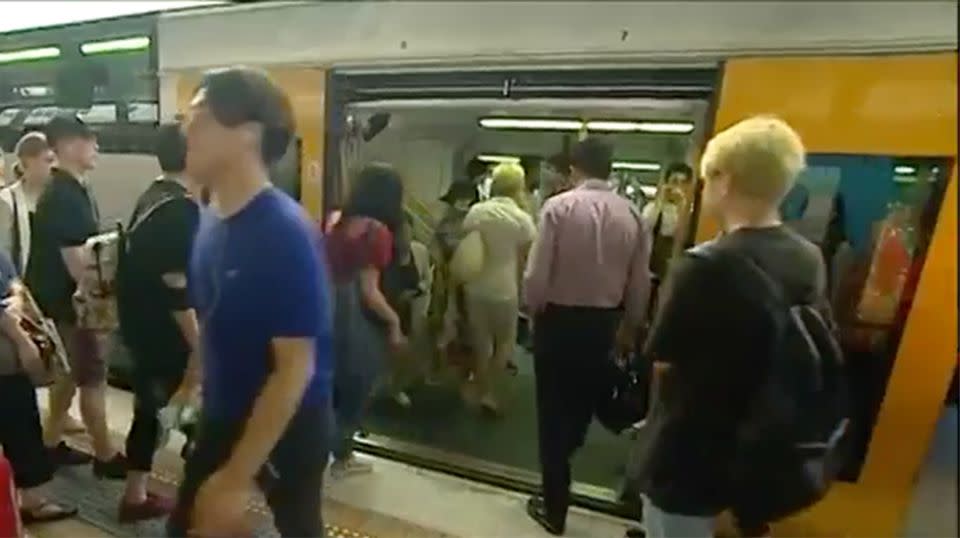 She rushed off a Sydney train in a hurry, unaware she had left the bag behind. Source: 7 News