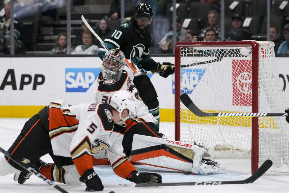 Anaheim Ducks goaltender John Gibson (36) deflects a San Jose Sharks shot during the first period of an NHL hockey game Thursday, Feb. 29, 2024, in San Jose, Calif. (AP Photo/Godofredo A. Vásquez)