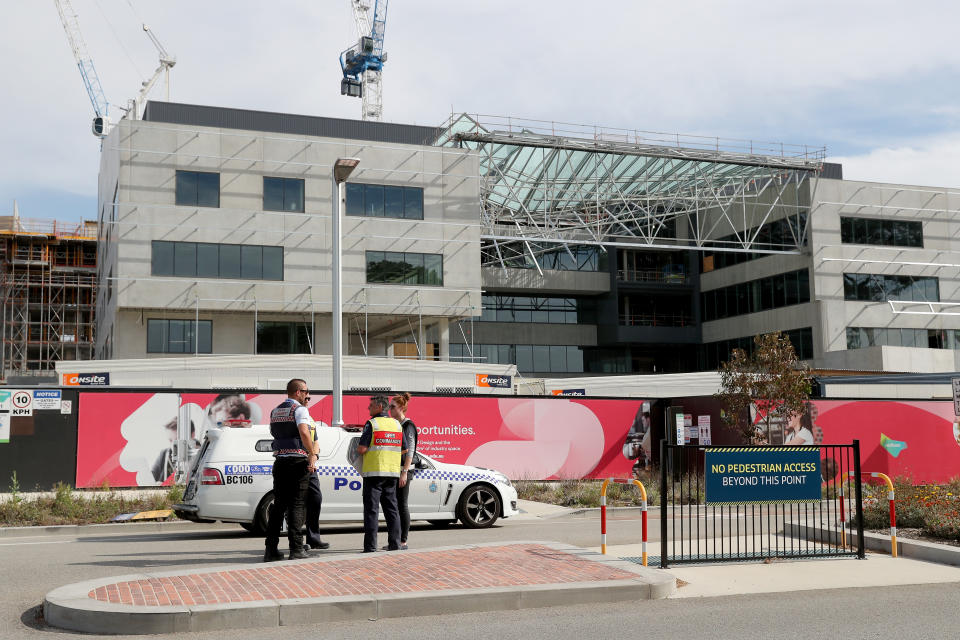 Emergency services are seen at the scene of a collapsed building at Curtin University, in Perth, on Tuesday, October 13, 2020.