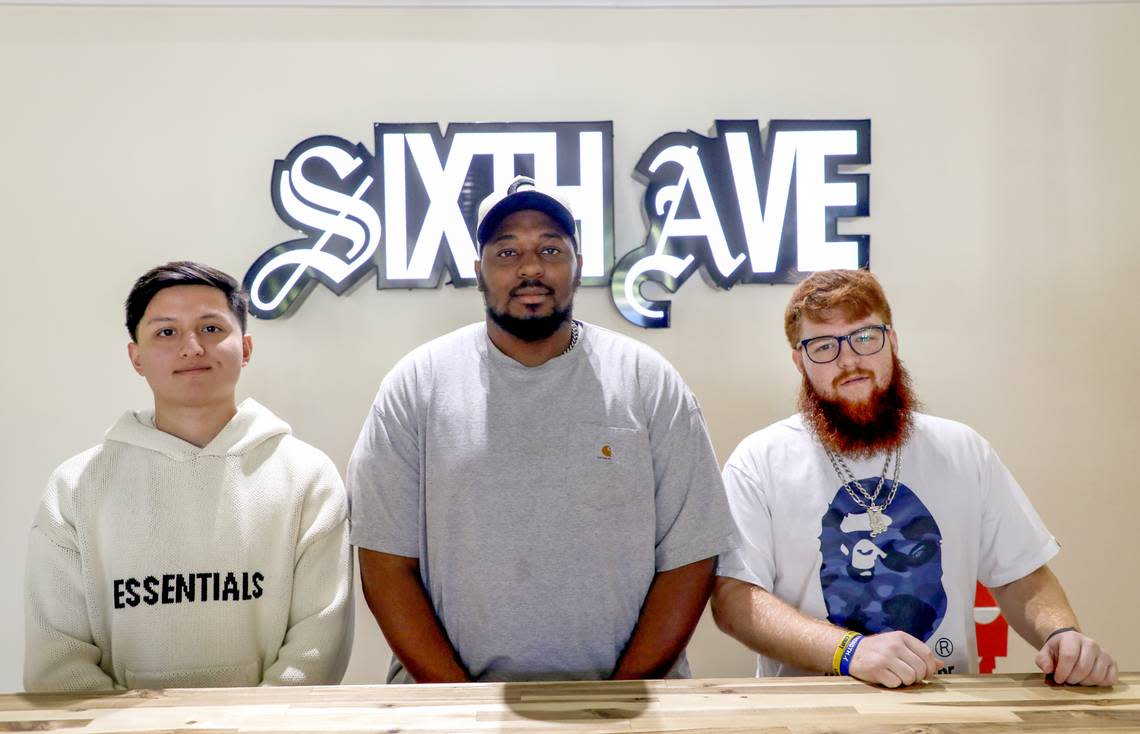 From left, the owners of Sixth Ave at 482 First St. in downtown Macon: Michael Paredes, managing director; Marquis Burns, creative director; and Jarredd Helms, director of operations.