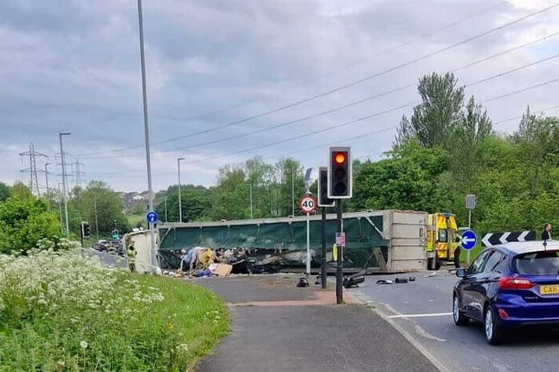 The overturned lorry at Ainley Top