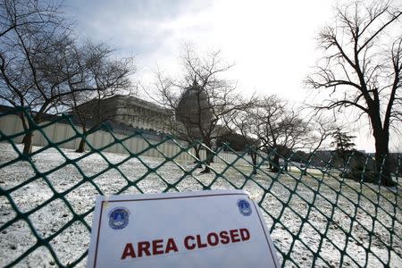 A sign which reads "Area closed" is seen outside the U.S. Capitol in Washington, January 21, 2016. REUTERS/Carlos Barria