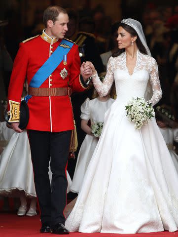 <p>Chris Jackson/Getty</p> Prince William, Duke of Cambridge and Catherine, Duchess of Cambridge smile following their marriage at Westminster Abbey on April 29, 2011 in London, England.