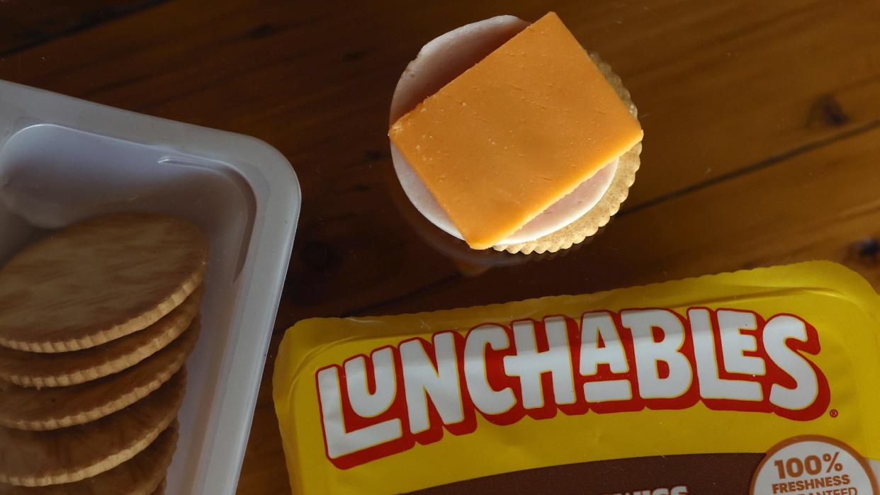  A package of Lunchables seen on a table. 