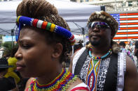 People wait to perform during a free outdoor event organized by The Broadway League during Juneteenth celebrations at Times Square on Saturday, June 19, 2021, in New York. Parades, picnics and lessons in history marked Juneteenth celebrations in the U.S., a day that marks the arrival of news to enslaved Black people in a Texas town that the Confederacy had surrendered in 1865 and they were free. (AP Photo/Eduardo Munoz Alvarez)