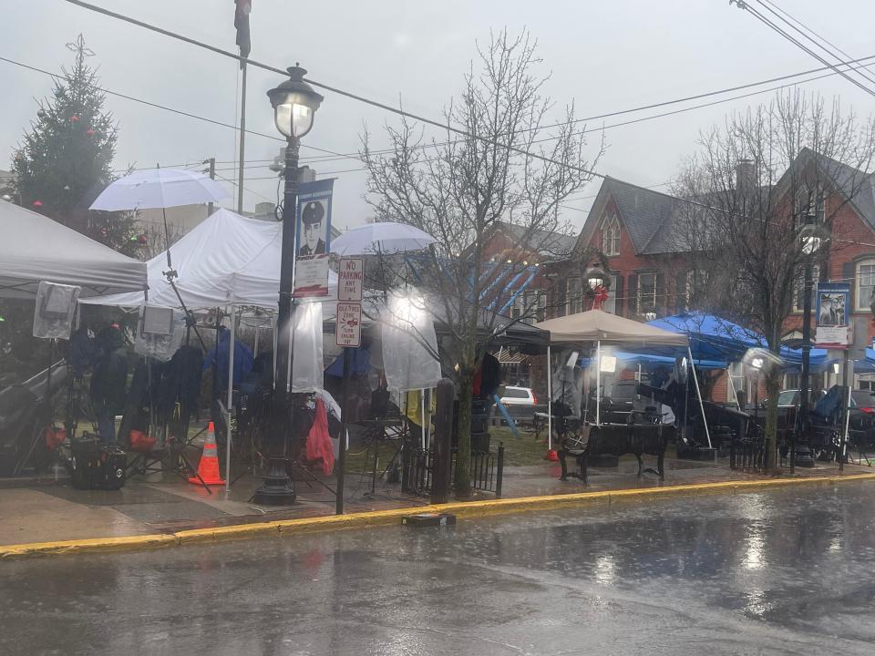 Media crews take shelter under tents in Stroudsburg's Courthouse Square the morning of Jan. 3, 2023 ahead of a court appearance for Bryan C. Kohberger. Kohberger was arrested in relation to the slaying of four Idaho college students at a home in Pennsylvania's Pocono Mountains in December. A Monroe County public defender said Kohberger does not plan to fight extradition to Idaho.