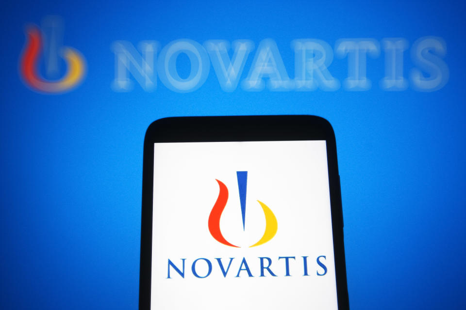 UKRAINE - 2021/06/29: In this photo illustration, Novartis (Novartis International AG) logo is seen on a smartphone and a pc screen. (Photo Illustration by Pavlo Gonchar/SOPA Images/LightRocket via Getty Images)