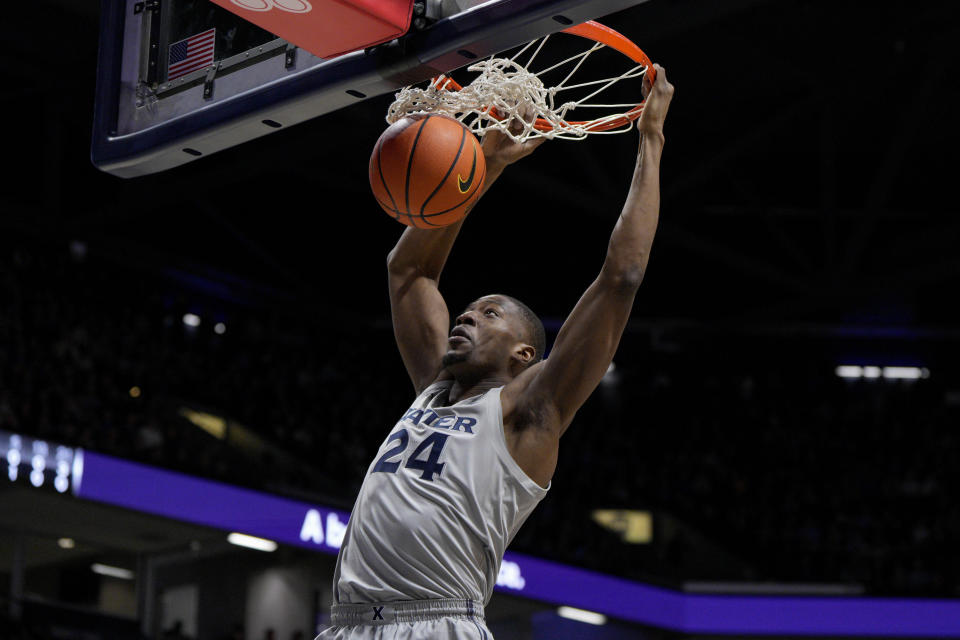 Xavier forward Abou Ousmane dunks during the first half of the team's NCAA college basketball game against Houston, Friday, Dec. 1, 2023, in Cincinnati. (AP Photo/Jeff Dean)