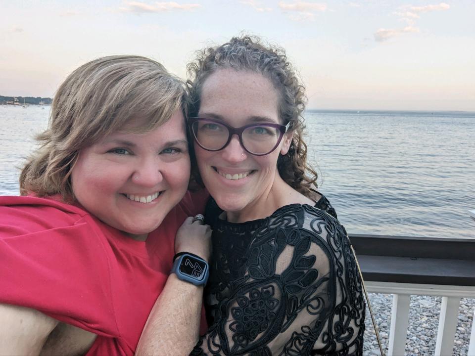 Meli Barber, right, said she and her wife, Carli Stevenson, are hoping to receive a blessing from a priest after Pope Francis declared priests can perform blessings for same-sex couples.