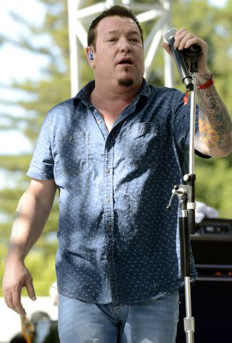 <p>Tim Mosenfelder/Getty </p> Steve Harwell performing with Smash Mouth in May 2014