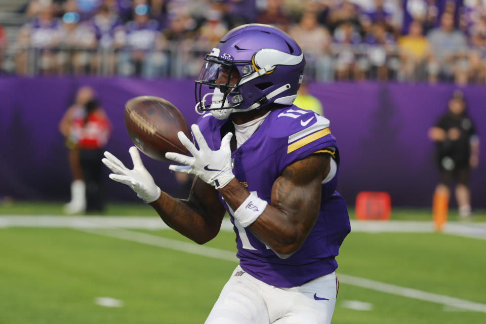 Minnesota Vikings wide receiver Trent Sherfield Sr. (11) pulls in a pass for a touchdown against the Las Vegas Raiders during the second half of an NFL football game Saturday, Aug. 10, 2024, in Minneapolis. (AP Photo/Bruce Kluckhohn)