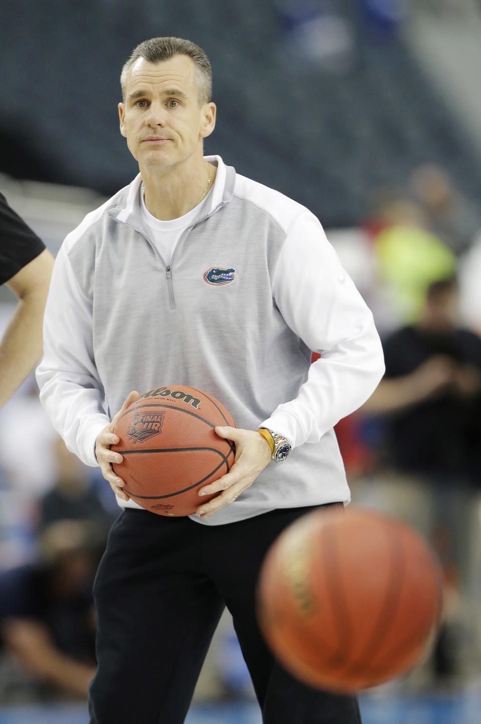 Florida head coach Billy Donovan runs a drill during practice for their NCAA Final Four tournament college basketball semifinal game Friday, April 4, 2014, in Dallas. Florida plays Connecticut on Saturday, April 5, 2014. (AP Photo/Eric Gay)