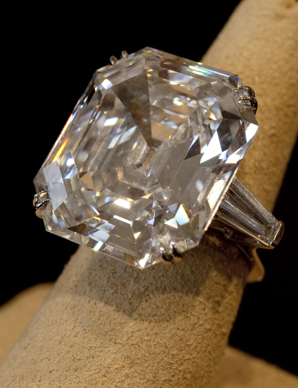 FILE - This Sept. 1, 2011 file photo shows "The Elizabeth Taylor Diamond," a 33.19 carat a gift to the actress from Richard Burton at Christie's, in New York. The 33.19-carat diamond ring given to Elizabeth Taylor by actor Richard Burton sold for over $8.8 million at auction in New York Tuesday, Dec. 13, 2011. The ring was purchased in 1968 for $305,000. But diamond experts caution that the average diamond ring bought for a few thousand dollars by a consumer, while it will never be worthless, will not appreciate much if at all in value. (AP Photo/Richard Drew, File)