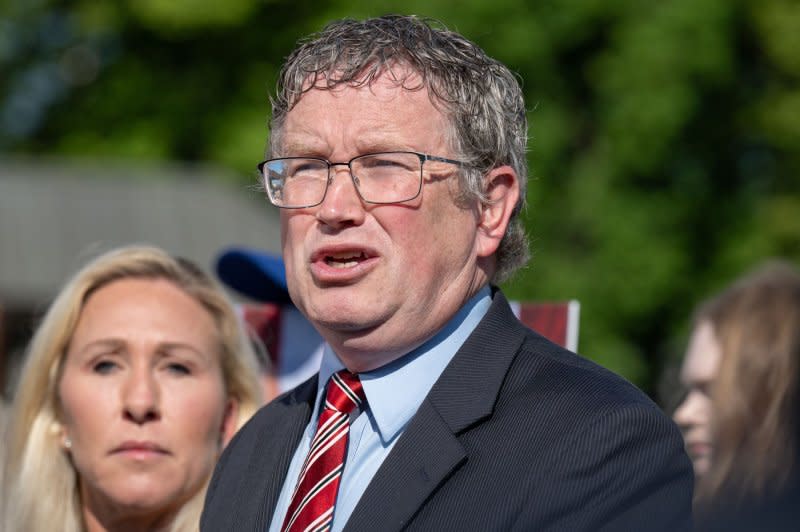 Reps. Thomas Massie, R-Ky., and Marjorie Taylor Greene, R-Ga., speak at a joint press conference at the U.S. Capitol on Wednesday. Photo by Annabelle Gordon/UPI