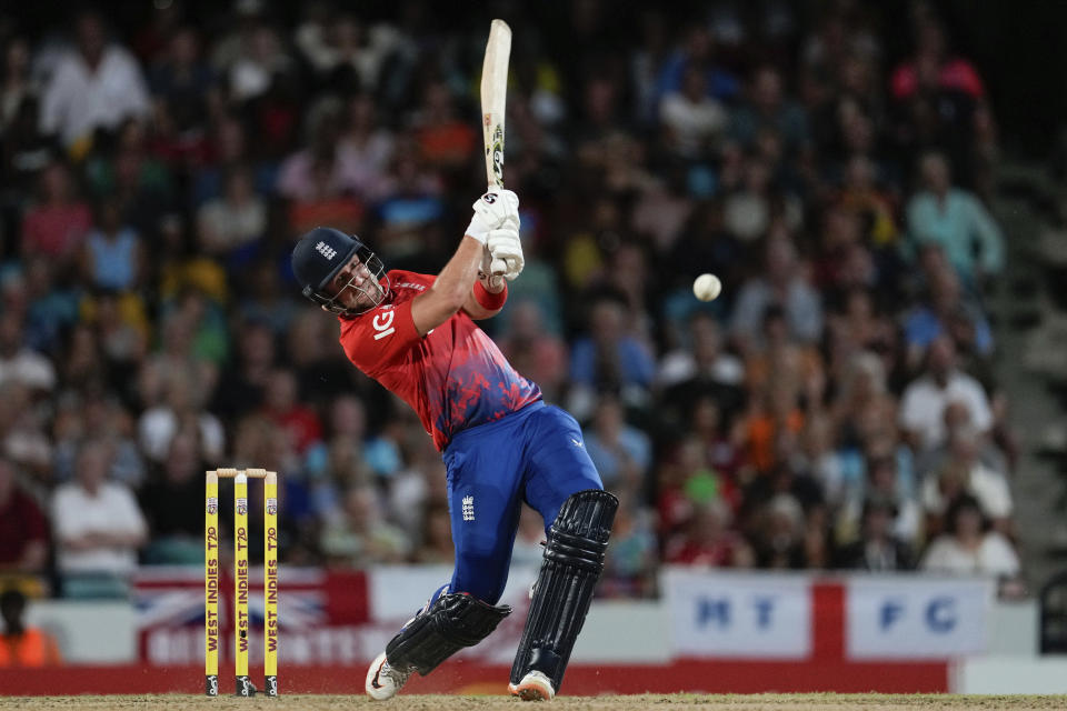 England's Liam Livingstone hits a four from a delivery of West Indies' Alzarri Joseph during the first T20 cricket match at Kensington Oval in Bridgetown, Barbados, Tuesday, Dec. 12, 2023. (AP Photo/Ricardo Mazalan)