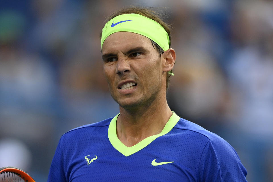 Rafael Nadal, of Spain, reacts during a match against Jack Sock at the Citi Open tennis tournament Wednesday, Aug. 4, 2021, in Washington. (AP Photo/Nick Wass)